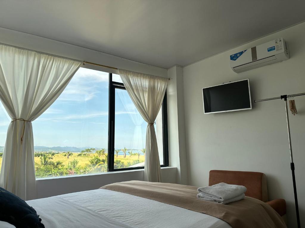 TV a/nebo společenská místnost v ubytování Hotel Punta Azul