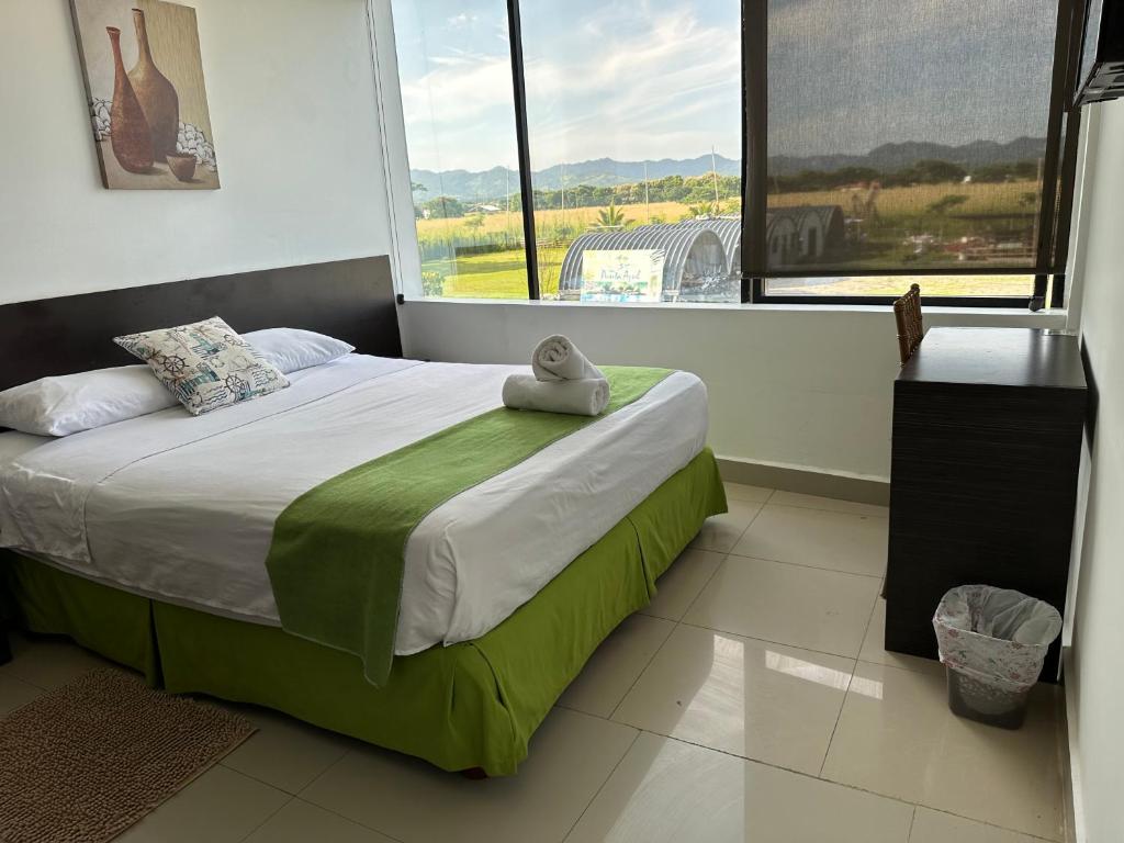 Postel nebo postele na pokoji v ubytování Hotel Punta Azul