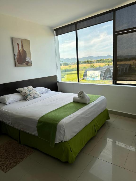 Postel nebo postele na pokoji v ubytování Hotel Punta Azul