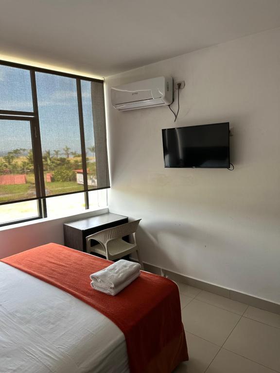 Postel nebo postele na pokoji v ubytování Hotel Punta Azul