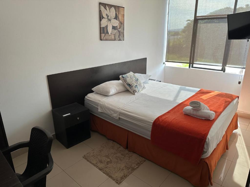 Postel nebo postele na pokoji v ubytování Hotel Punta Azul