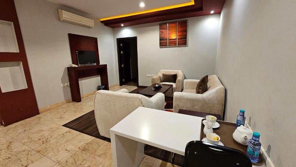 Posezení v ubytování رؤوم إن للشقق الفندقية-Raoum Inn Hotel Apartments