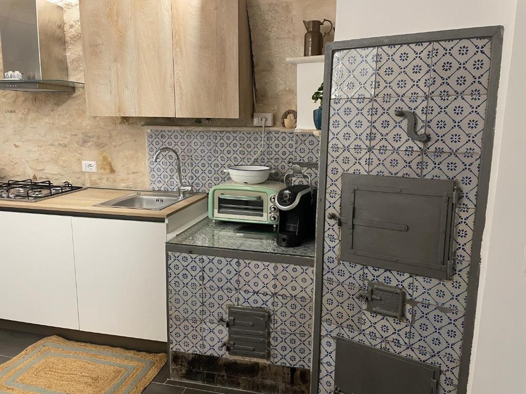 Kuchyň nebo kuchyňský kout v ubytování ponte vecchio b&b