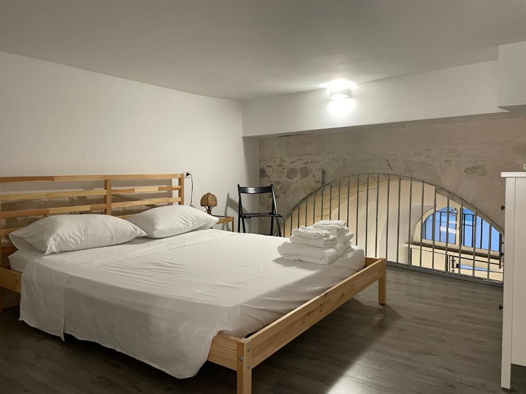 Postel nebo postele na pokoji v ubytování ponte vecchio b&b