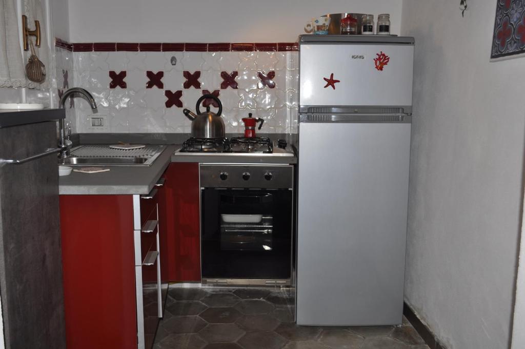 Kuchyňa alebo kuchynka v ubytovaní DIMORA EPODE'