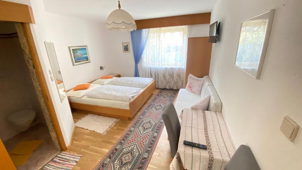 Postel nebo postele na pokoji v ubytování Haus Mairösl