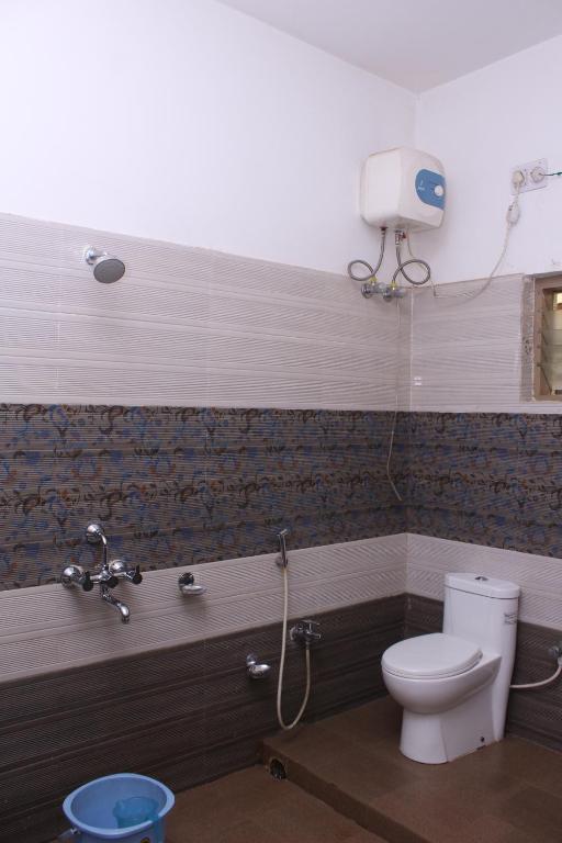 Koupelna v ubytování CHETAN INN HOTEL