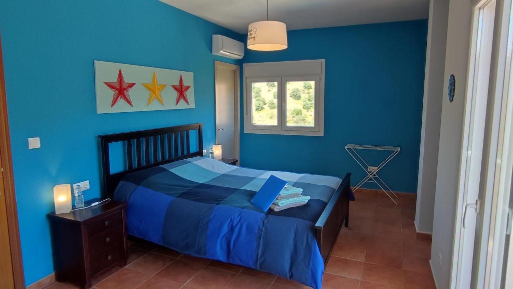 Posteľ alebo postele v izbe v ubytovaní B&B Casa El Corasueño