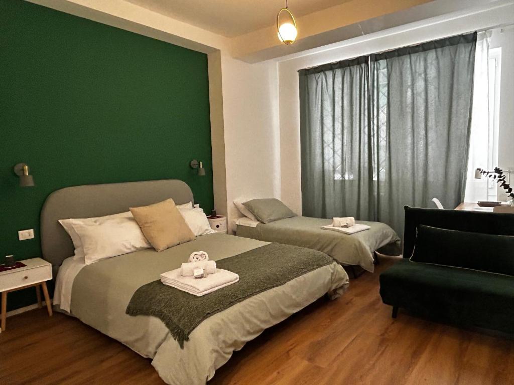 Posteľ alebo postele v izbe v ubytovaní IL NINFEO San Giovanni ROMA