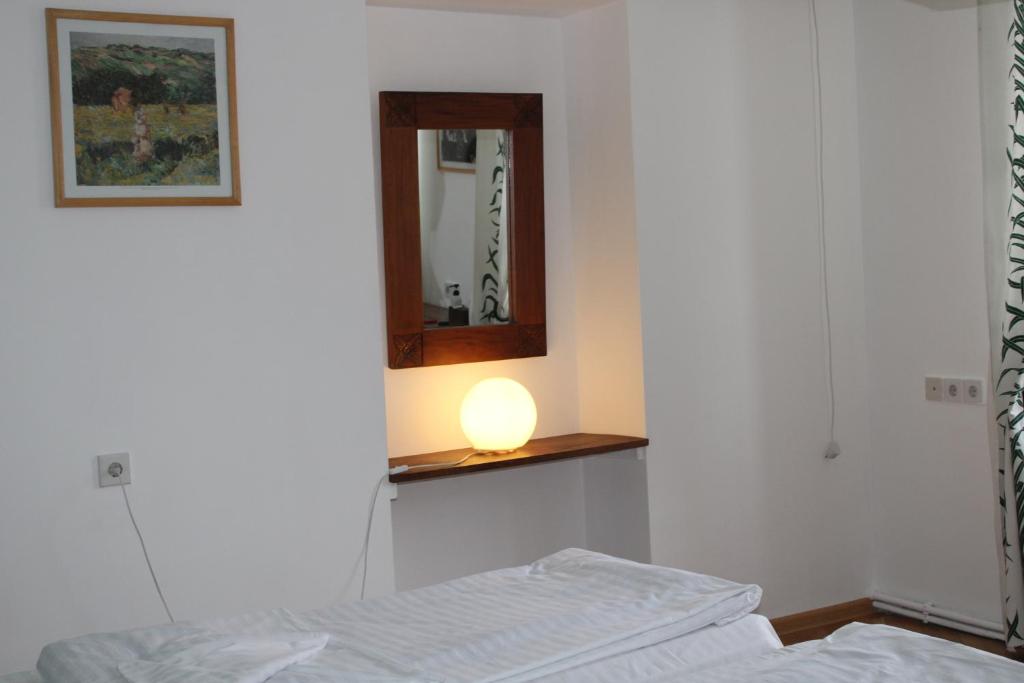 Postel nebo postele na pokoji v ubytování JR's House