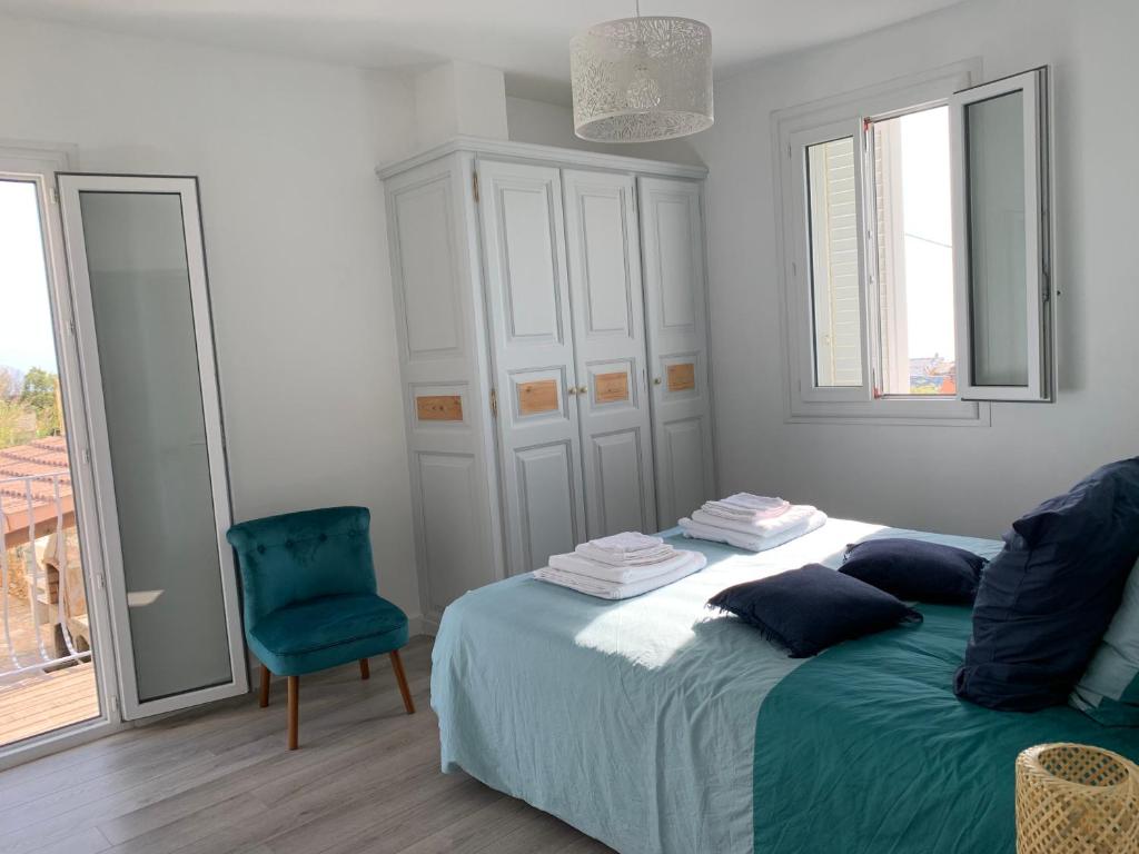 Posteľ alebo postele v izbe v ubytovaní Magnifique maison avec vue mer hauteur de Bastia