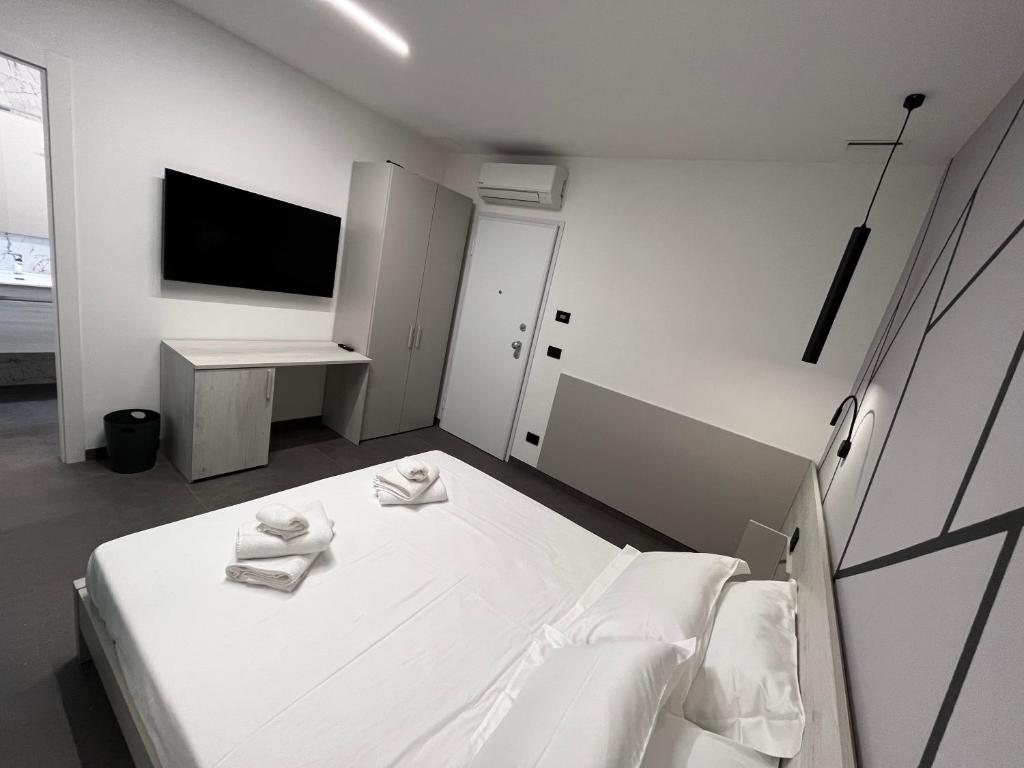 TV a/nebo společenská místnost v ubytování B&B A due passi dal mare