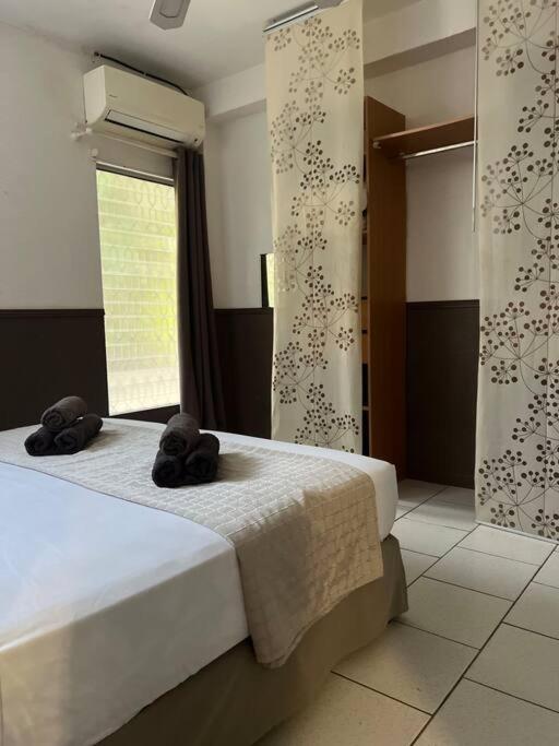 Postel nebo postele na pokoji v ubytování Le Ti Dauphin plage Anse a L'âne