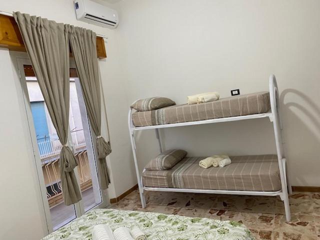 Postel nebo postele na pokoji v ubytování Bonita Cora