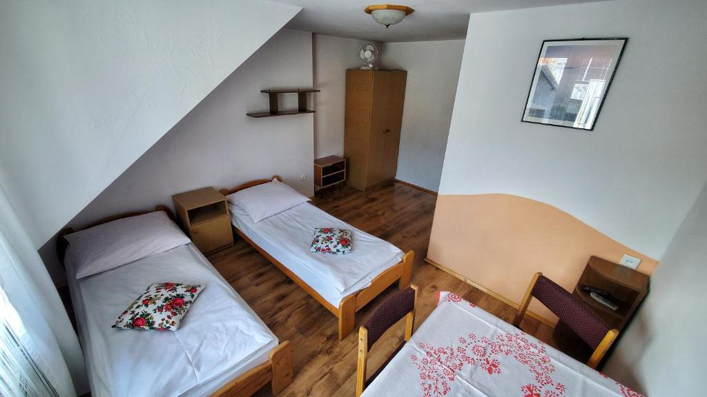 Pokoje do Wynajęcia u Lusi - Chambre Jumelle Avec Salle De Bain Partagée
