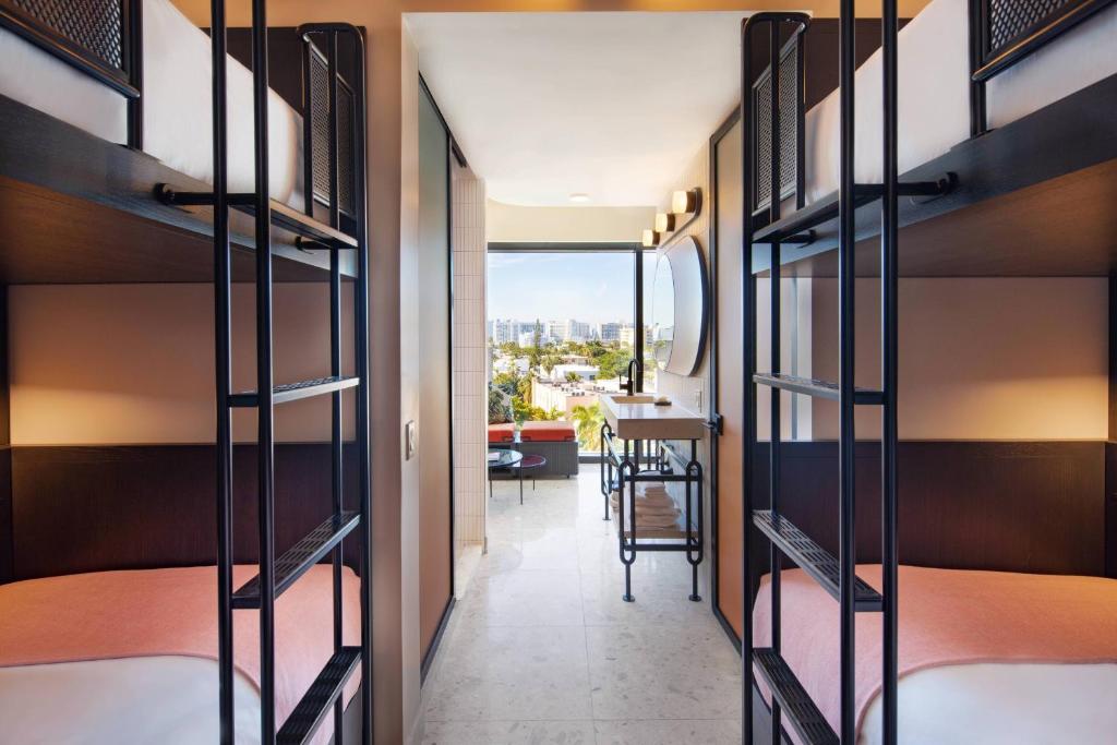 Moxy Miami South Beach - Two Bunk Beds Guest Room With Four Twin/Single Beds, And Seating Area