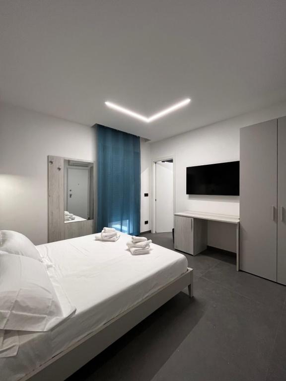 Postel nebo postele na pokoji v ubytování B&B A due passi dal mare