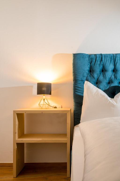 Postel nebo postele na pokoji v ubytování Hotel Greif