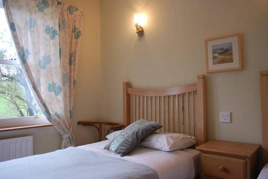 Postel nebo postele na pokoji v ubytování Seapoint House