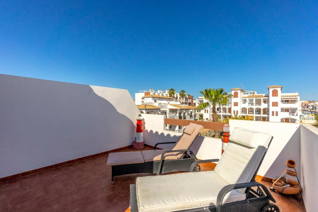 Fotografia z galérie ubytovania CB Living - Scenic duplex with pool in Punta Prima v destinácii Orihuela Costa