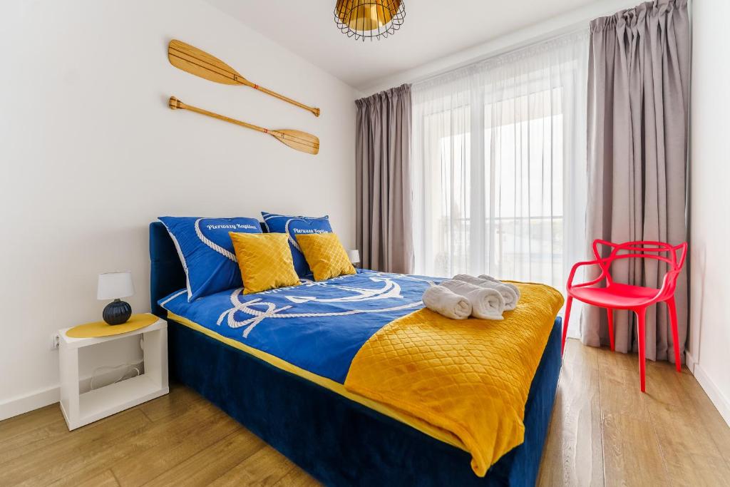 Posteľ alebo postele v izbe v ubytovaní Apartament Słońce i Plaża Kołobrzeg