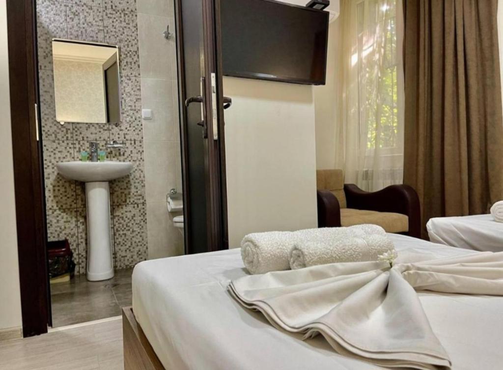 Postel nebo postele na pokoji v ubytování Merien hotel