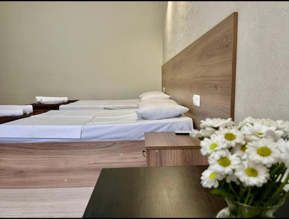 Postel nebo postele na pokoji v ubytování Merien hotel