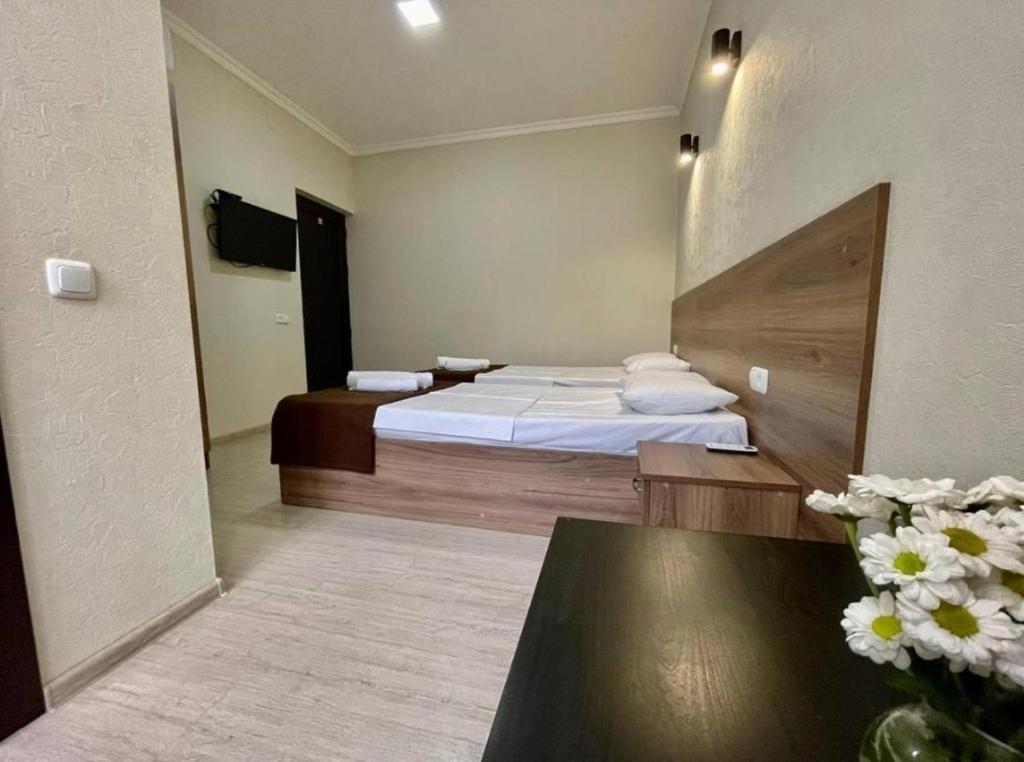 Postel nebo postele na pokoji v ubytování Merien hotel