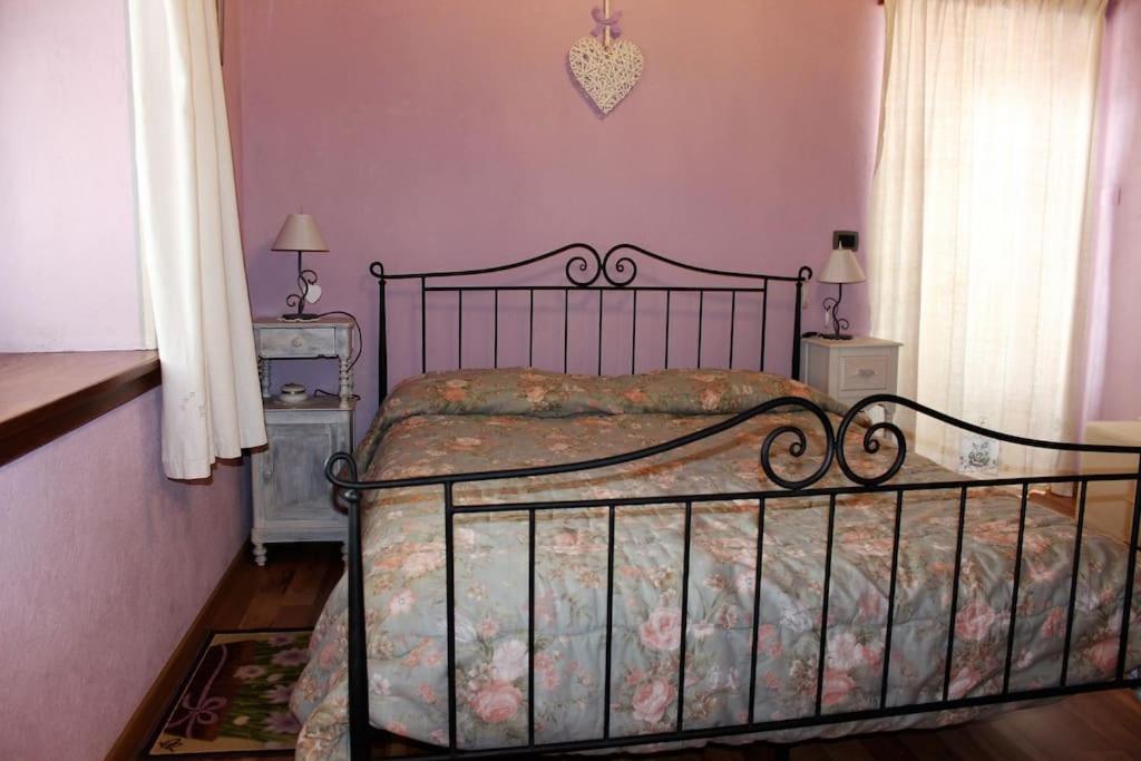 Postel nebo postele na pokoji v ubytování Casa Coccinella Valdieri