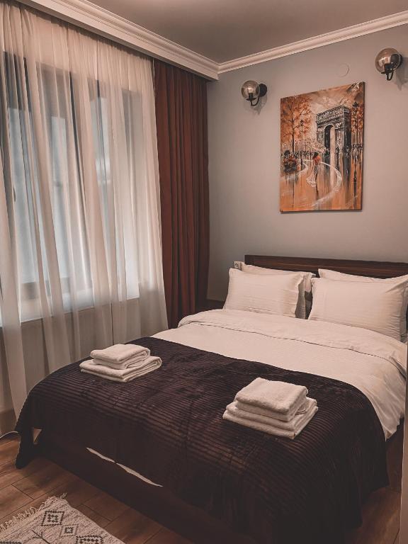Postel nebo postele na pokoji v ubytování Guesthouse Relax in Kazbegi