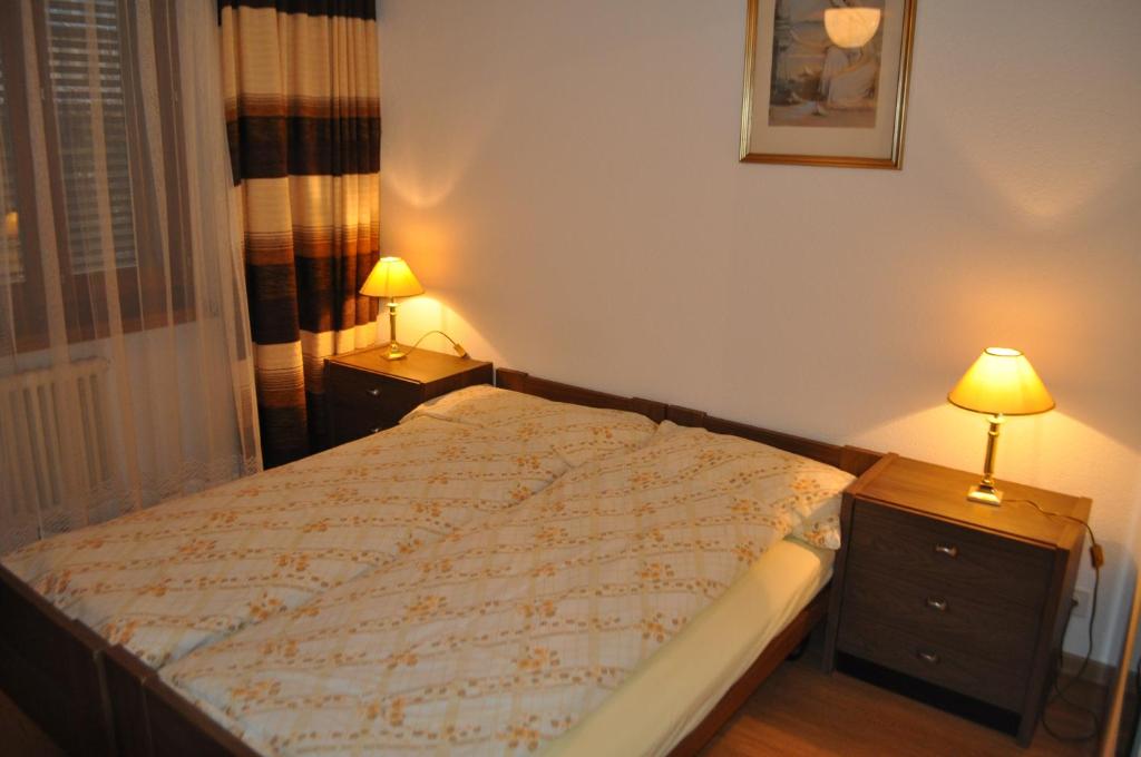 Postel nebo postele na pokoji v ubytování Appartamenti Fortunella