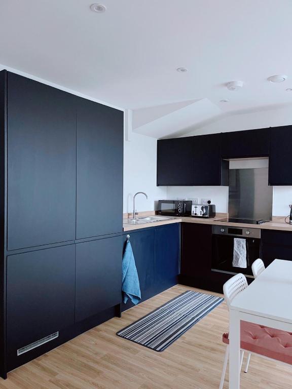 Kuchyň nebo kuchyňský kout v ubytování Modern House
