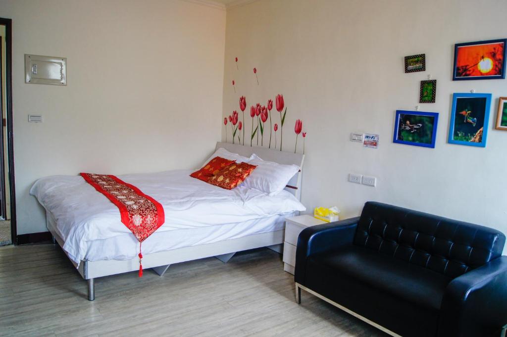 Postel nebo postele na pokoji v ubytování Ding Ding Homestay
