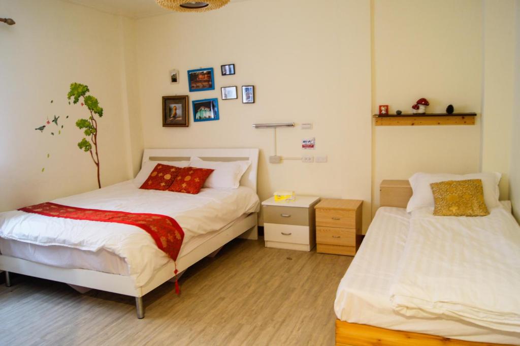 Postel nebo postele na pokoji v ubytování Ding Ding Homestay