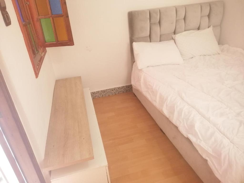 Postel nebo postele na pokoji v ubytování Akwaba lodge