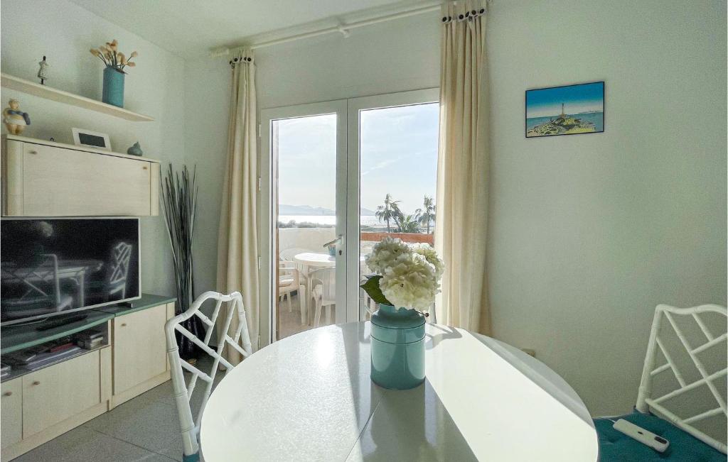 A television and/or entertainment centre at Nice Apartment In La Manga With Wifi