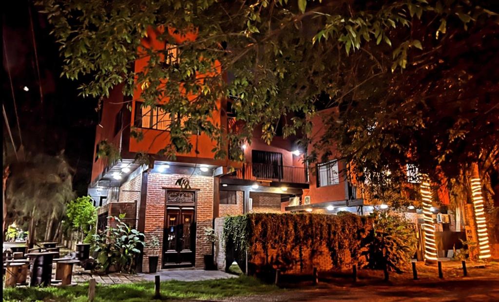 a building at night with lights in front of it at Monica’s Apartments in Canning