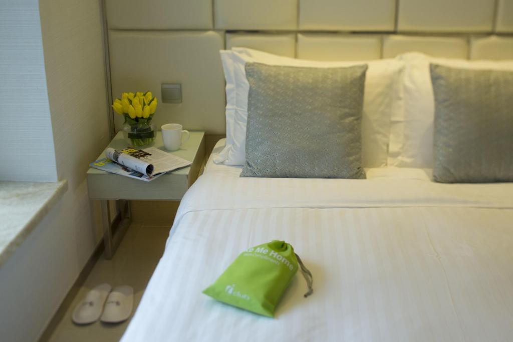 Letto o letti in una camera di iclub Sheung Wan Hotel