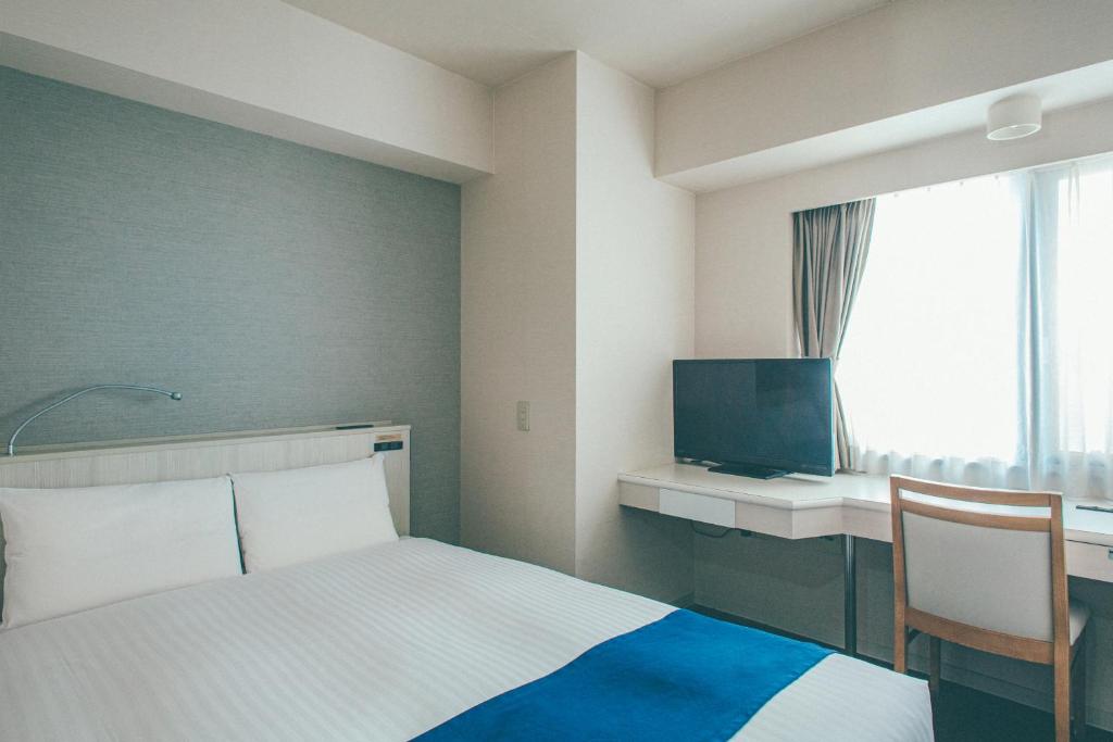 Katil atau katil-katil dalam bilik di Hamilton Hotel Blue