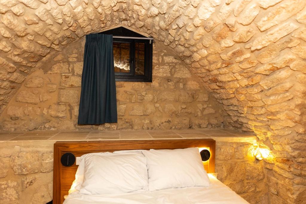 Postel nebo postele na pokoji v ubytování Saint Jacob Hotel