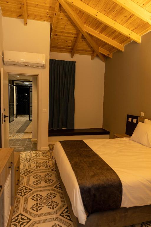Postel nebo postele na pokoji v ubytování Saint Jacob Hotel
