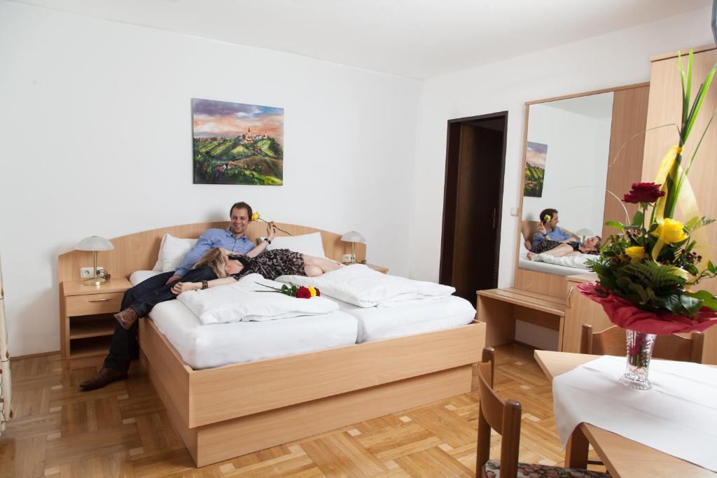 Postel nebo postele na pokoji v ubytování Gästehaus Ferk - Frühstückspension, Bed & Breakfast