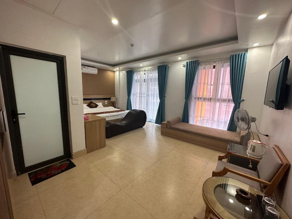 Ngoc Huyen Hotel - Deluxe Doppelzimmer Mit Balkon