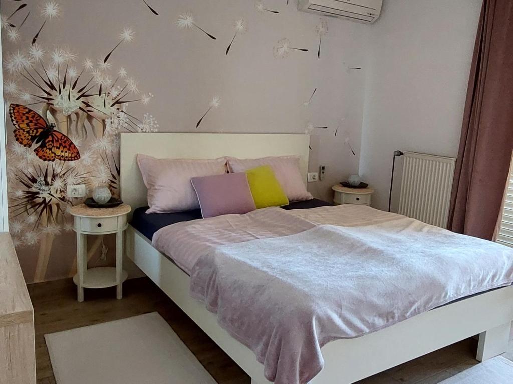 Voodi või voodid majutusasutuse Apartman Saric K&M toas