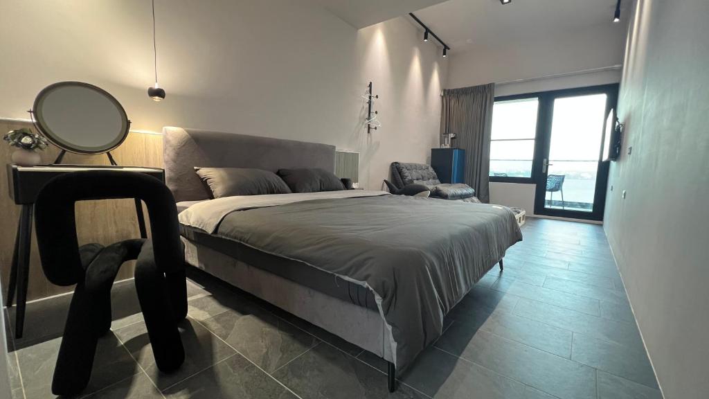 Postel nebo postele na pokoji v ubytování 沒有名字Unnamed B&B