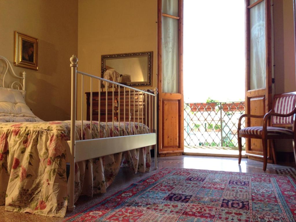 Postel nebo postele na pokoji v ubytování Cosetta Guest House