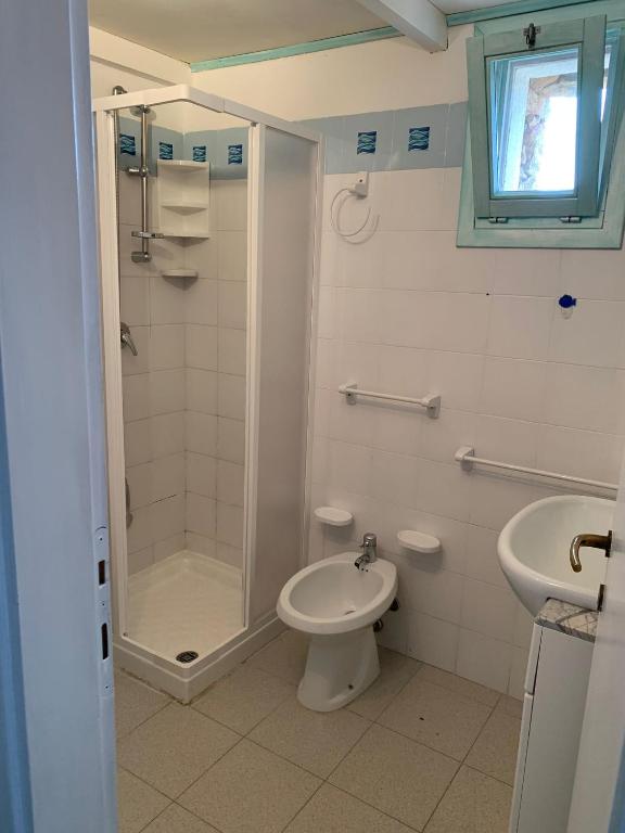 Koupelna v ubytování Residenze Coda Cavallo