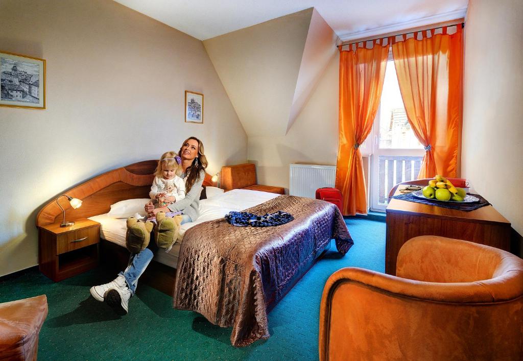 Postel nebo postele na pokoji v ubytování Penzión Kamzik