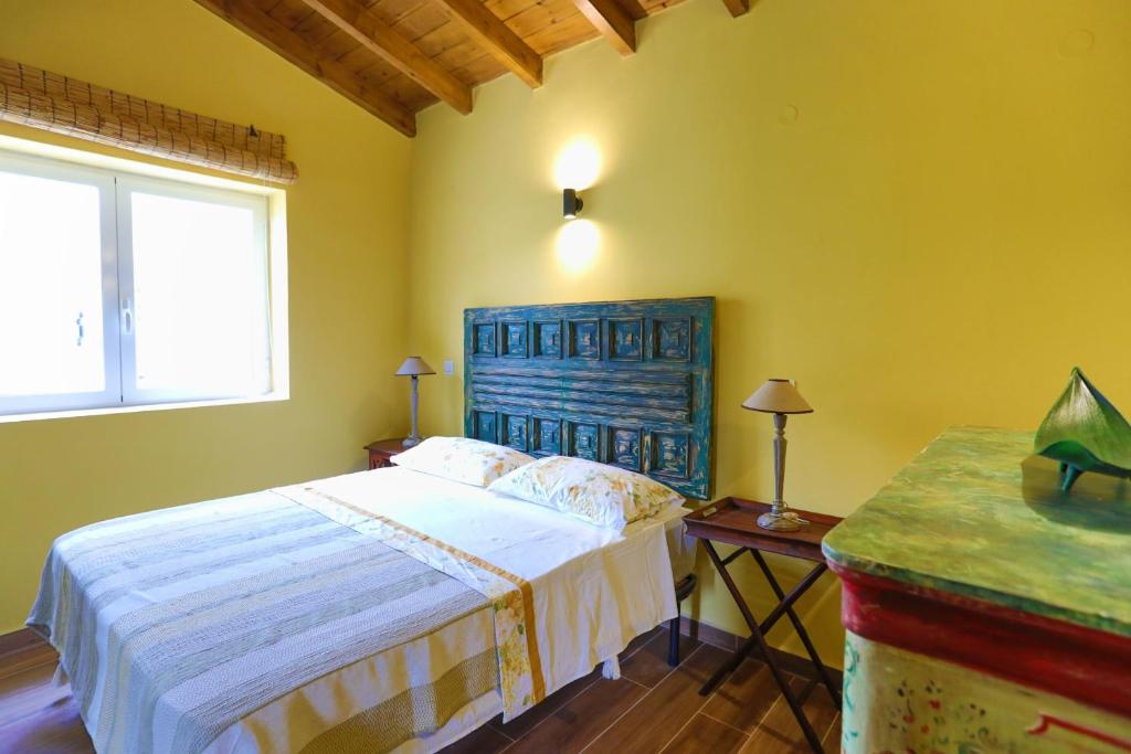 Postel nebo postele na pokoji v ubytování Fede - Danilia Cottages