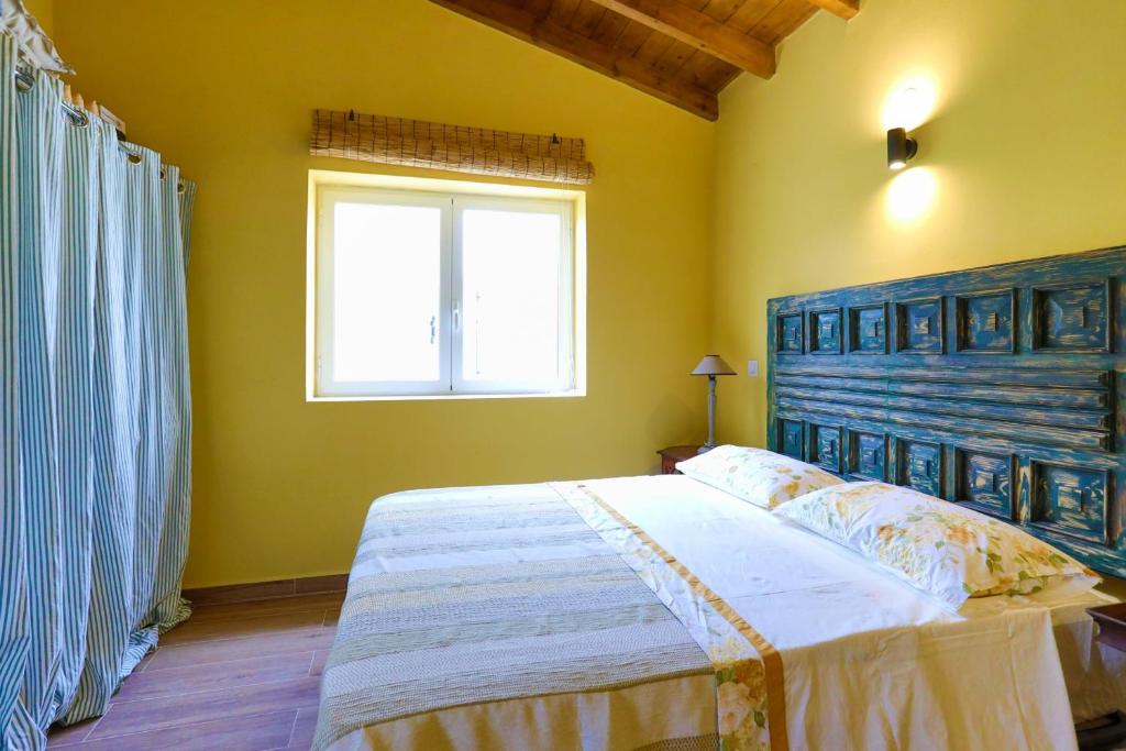 Postel nebo postele na pokoji v ubytování Fede - Danilia Cottages